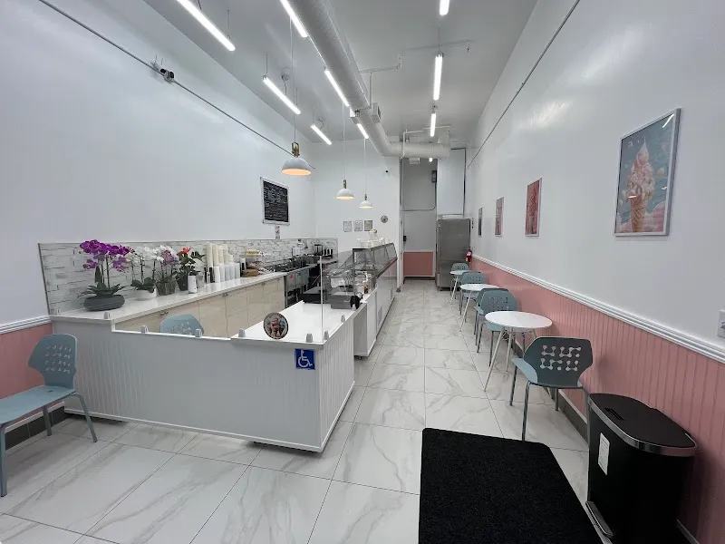 Inside Happy Scoops showing the shop's warm, colorful interior