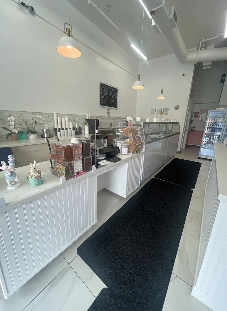 Happy Scoops ice cream shop interior showing colorful scoops and welcoming counter